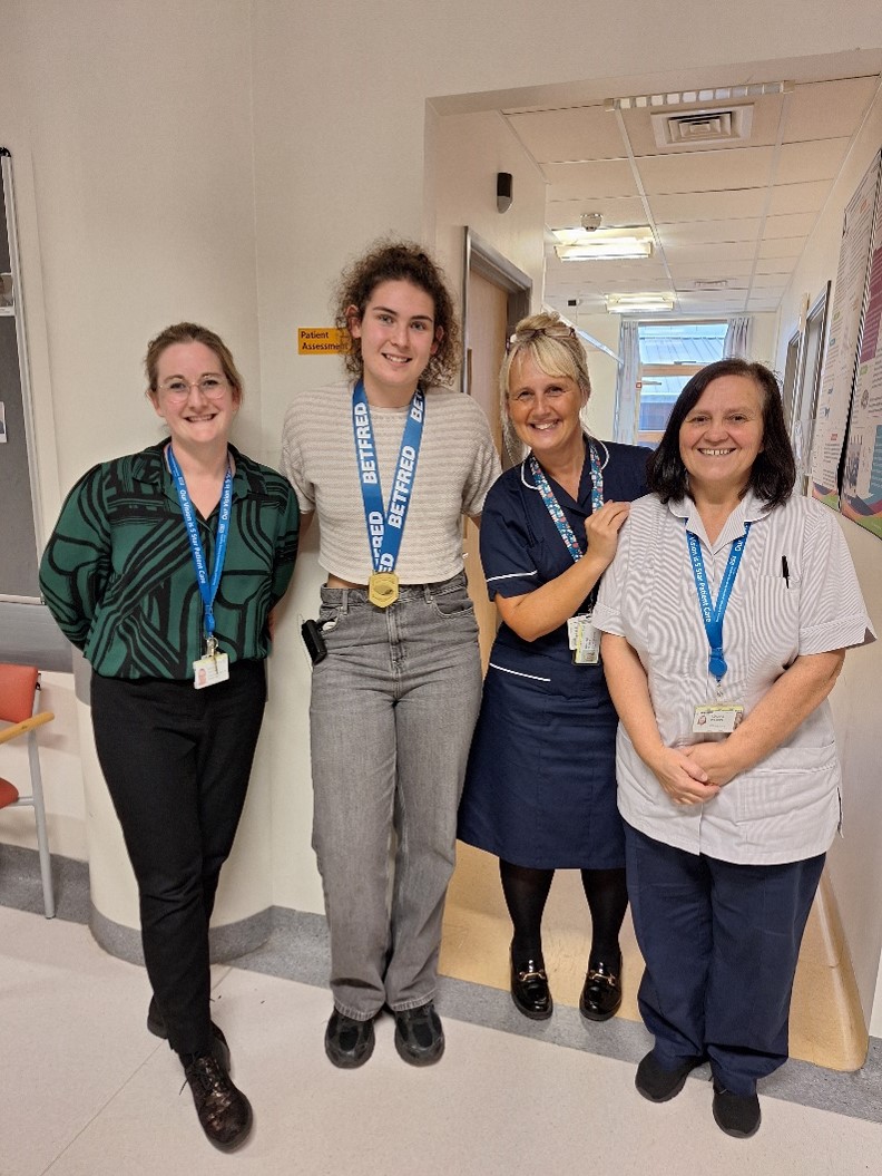 A group of women posing for a photo